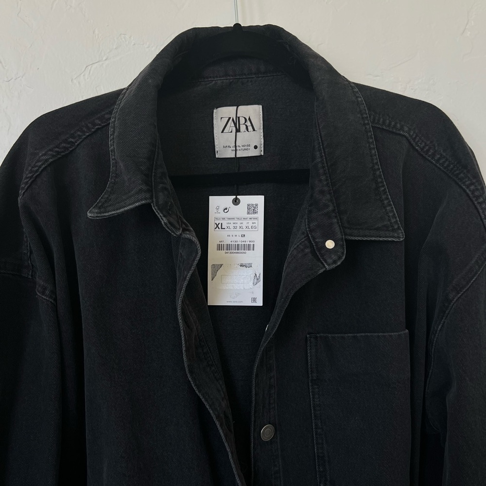 Oversized washed denim jacket with frayed hem